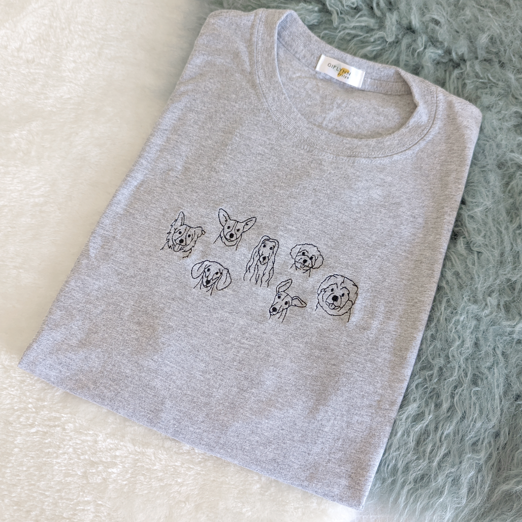 It'll be okay, we have dogs! - Embroidered T-Shirt
